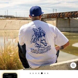 Men's White Graphic Tee with Blue Design